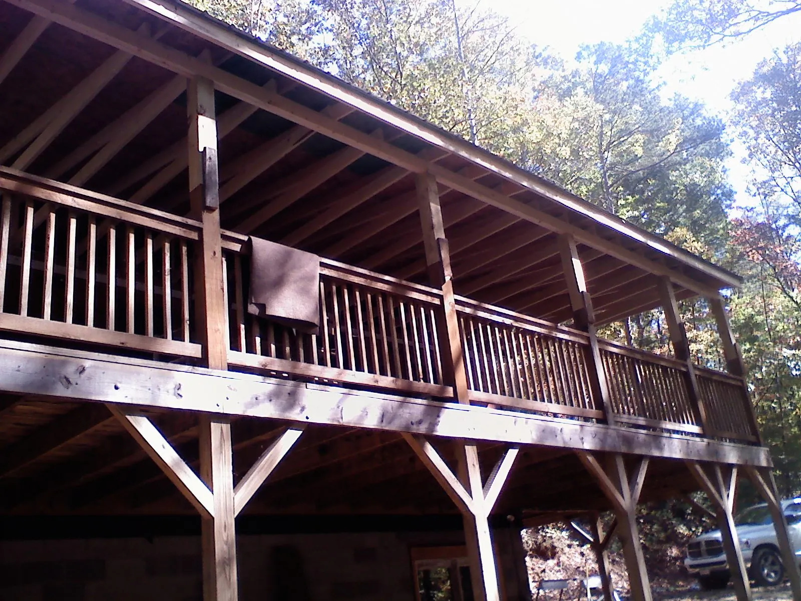 Timber framing under a new elevated porch and deck — Roof Leak Repair in Belchertown by Roofing Brothers